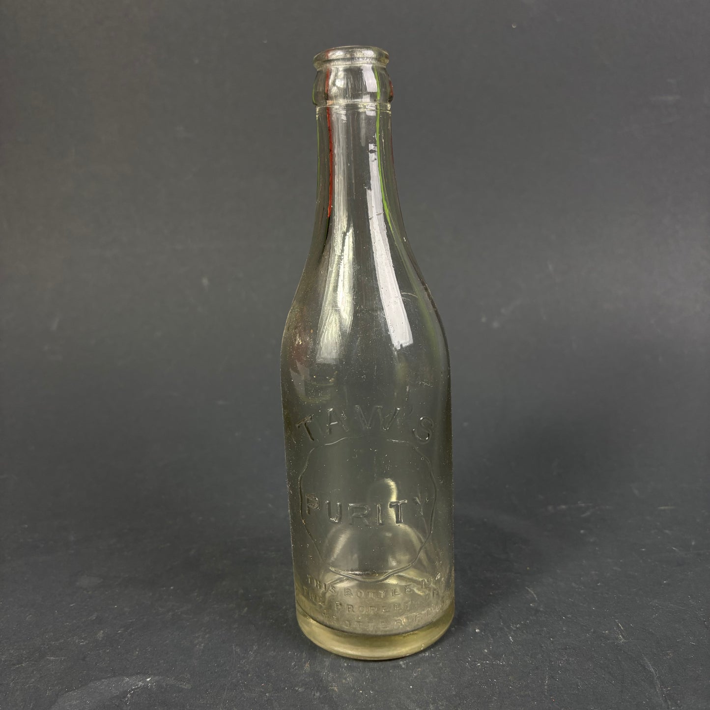 Taw's Purity Antique Crown Seal Soft Drink Bottle c.1920s–1930s