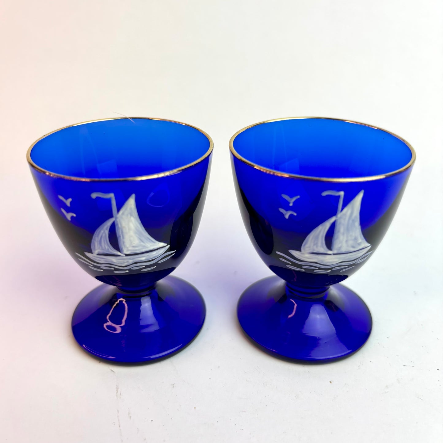 Pair Vintage Bristol Blue Glass Goblets with Hand-Painted Sailing Ships & Gilt Rims