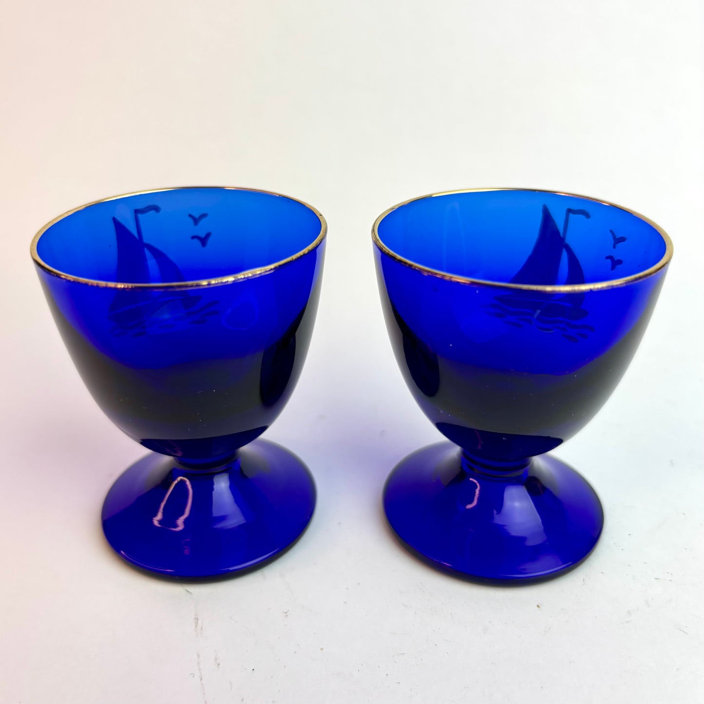Pair Vintage Bristol Blue Glass Goblets with Hand-Painted Sailing Ships & Gilt Rims