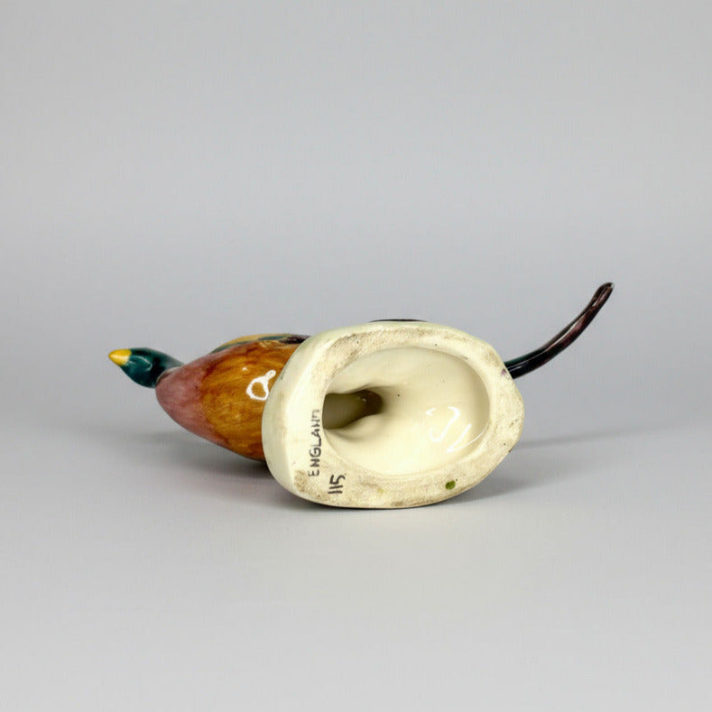 Decorative duck call on a light gray background