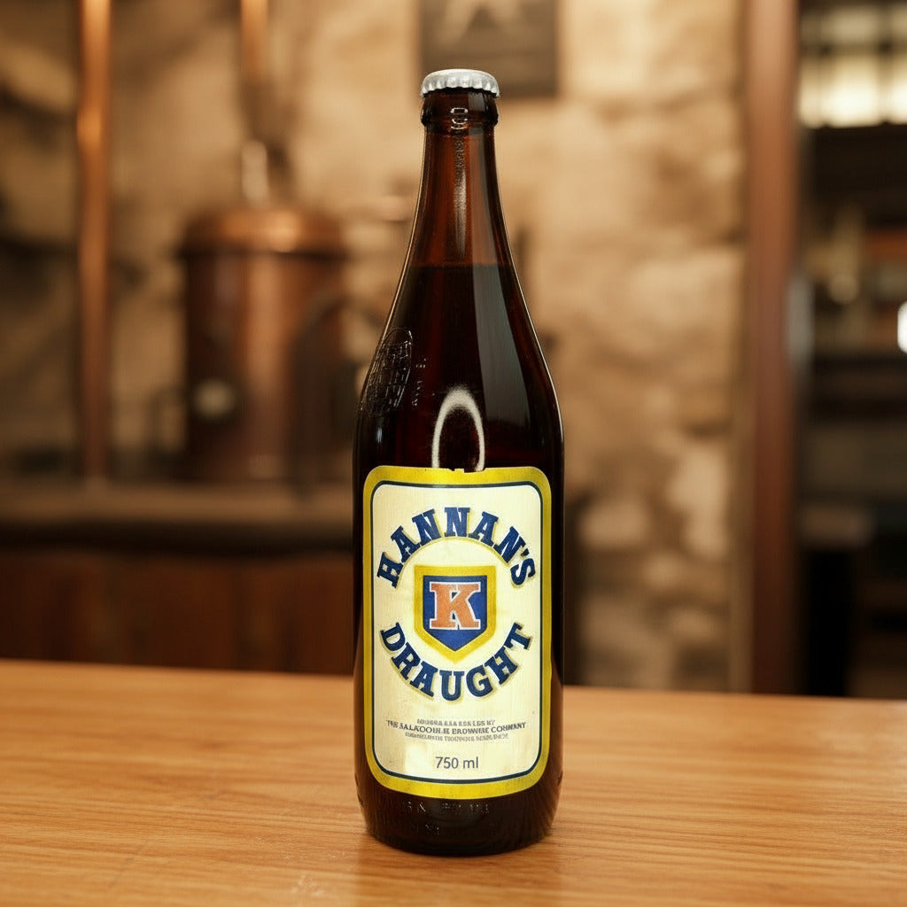 Hannans Draught beer bottle on a light gray background