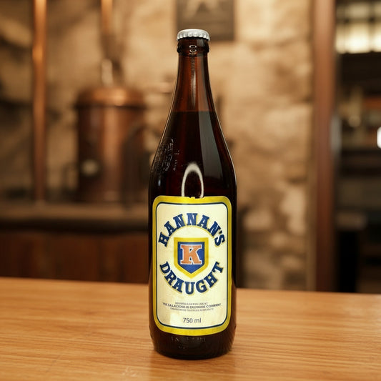 Hannans Draught beer bottle on a light gray background