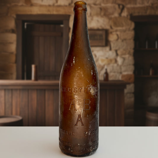 Brown bottle with embossed text on a white background