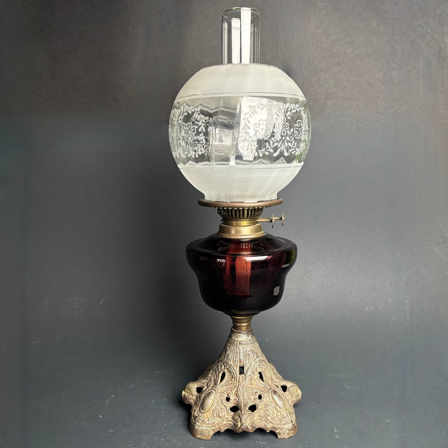 Victorian Kerosene Oil Lamp – Cranberry Glass Font with Etched Globe & Cast Iron Base