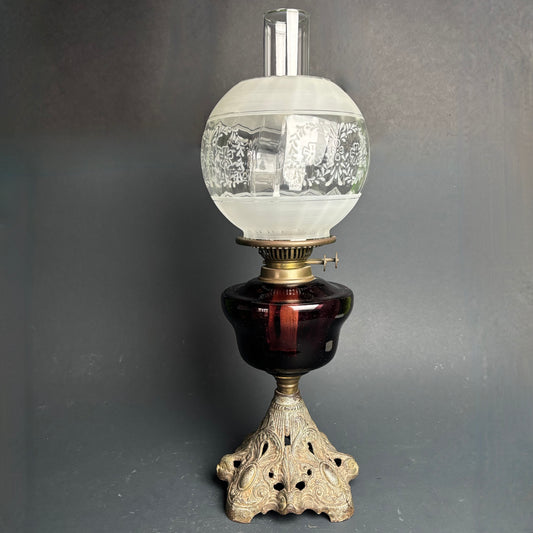 Victorian Kerosene Oil Lamp – Cranberry Glass Font with Etched Globe & Cast Iron Base