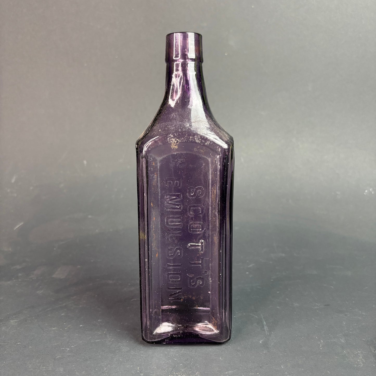 Scott’s Emulsion Bottle Amethyst Glass Sun Purple c.1900s Embossed