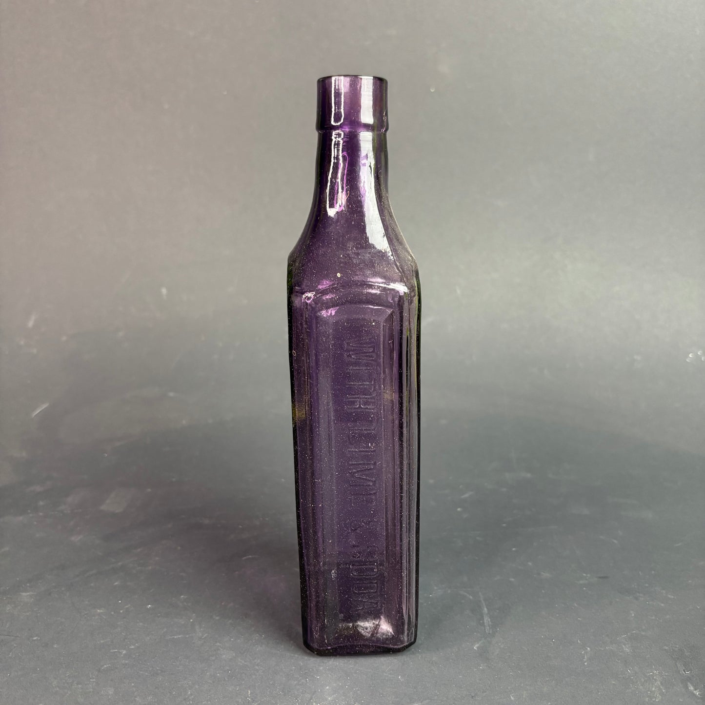 Scott’s Emulsion Bottle Amethyst Glass Sun Purple c.1900s Embossed