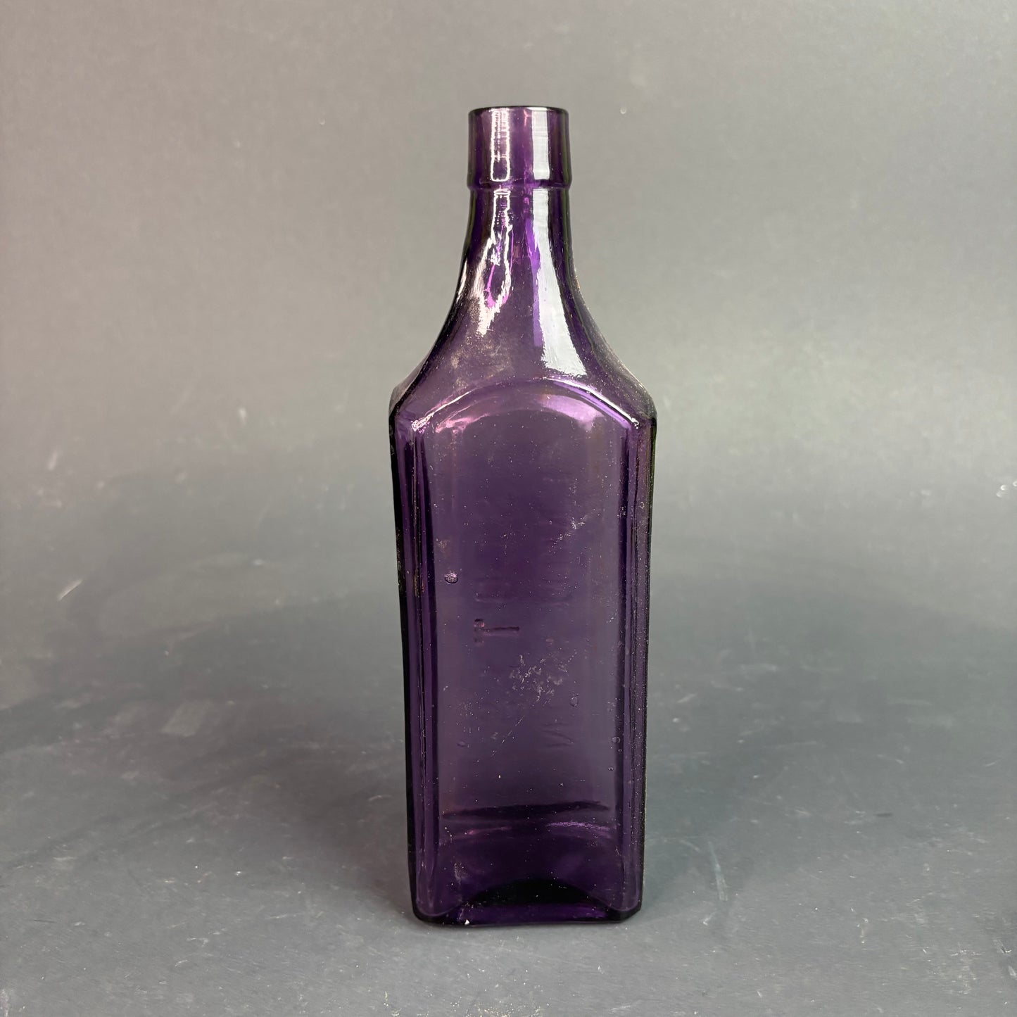 Scott’s Emulsion Bottle Amethyst Glass Sun Purple c.1900s Embossed