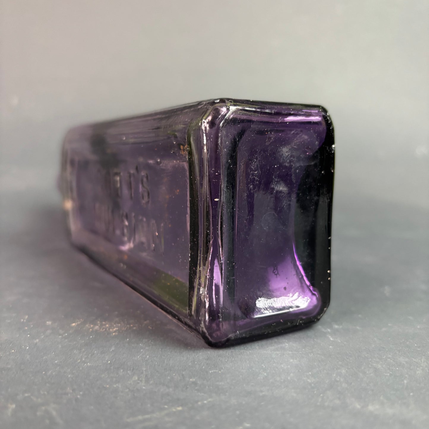 Scott’s Emulsion Bottle Amethyst Glass Sun Purple c.1900s Embossed