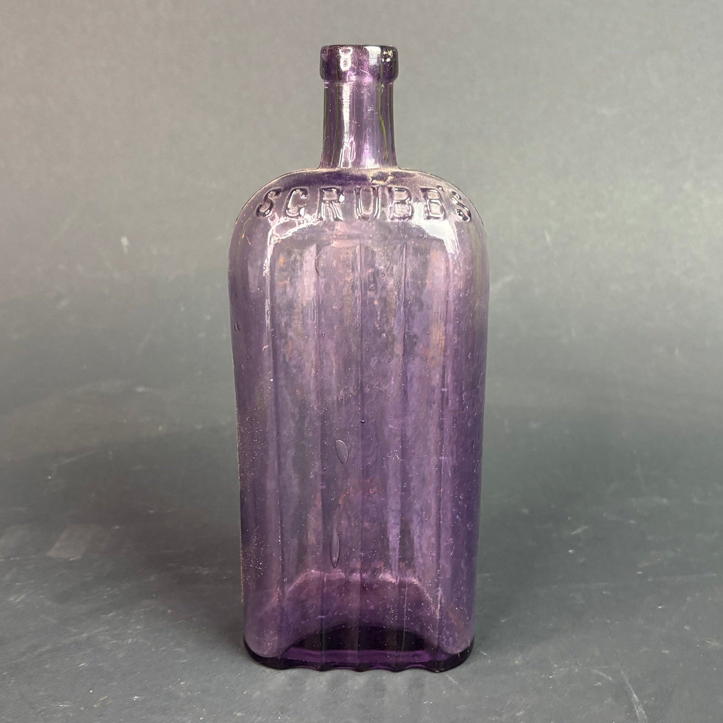 Antique S.C. Rubbs Chemist Bottle – Sun Purpled Glass c1900