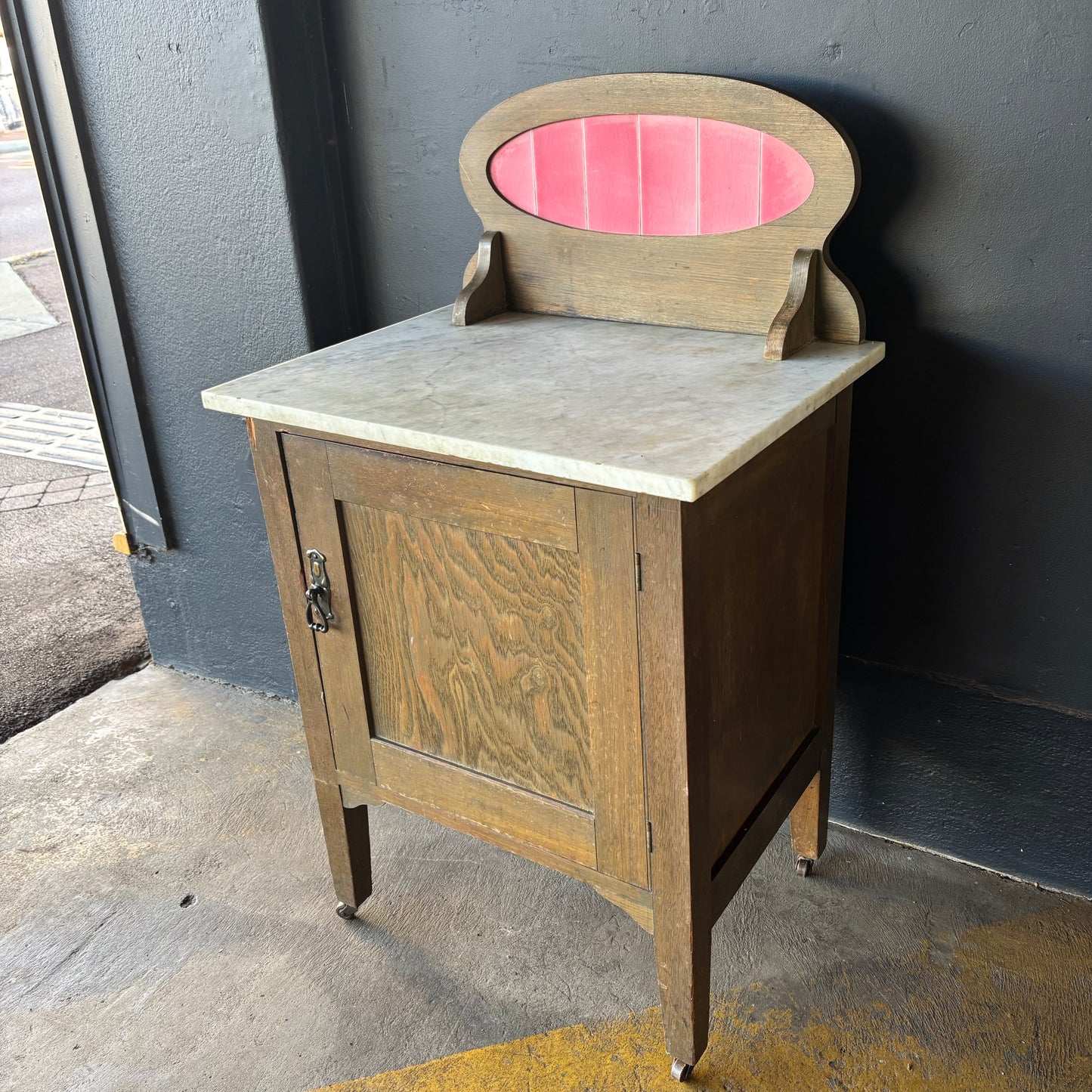 Antique Marble Top Washstand with Pink Tile Splashback on Castors