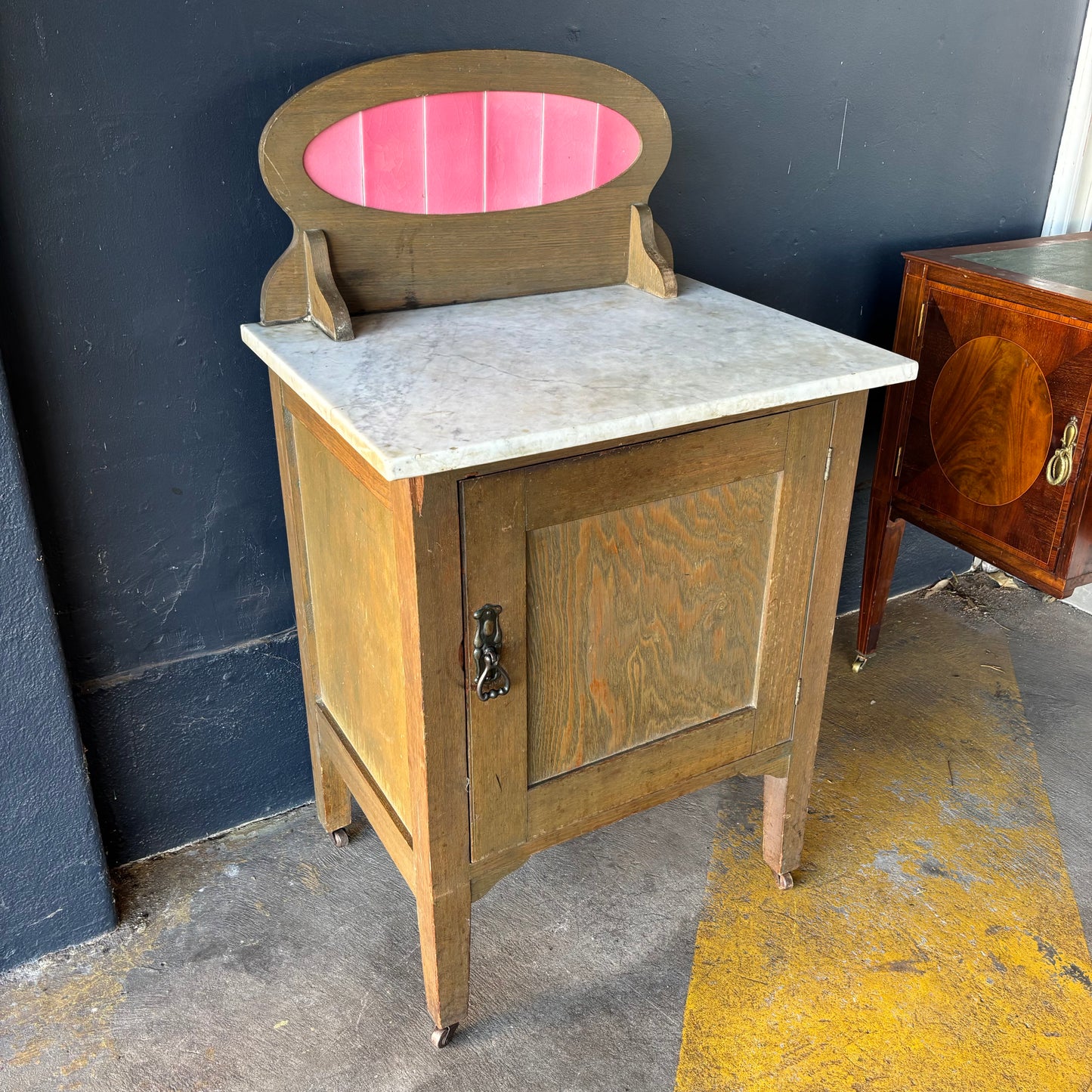 Antique Marble Top Washstand with Pink Tile Splashback on Castors