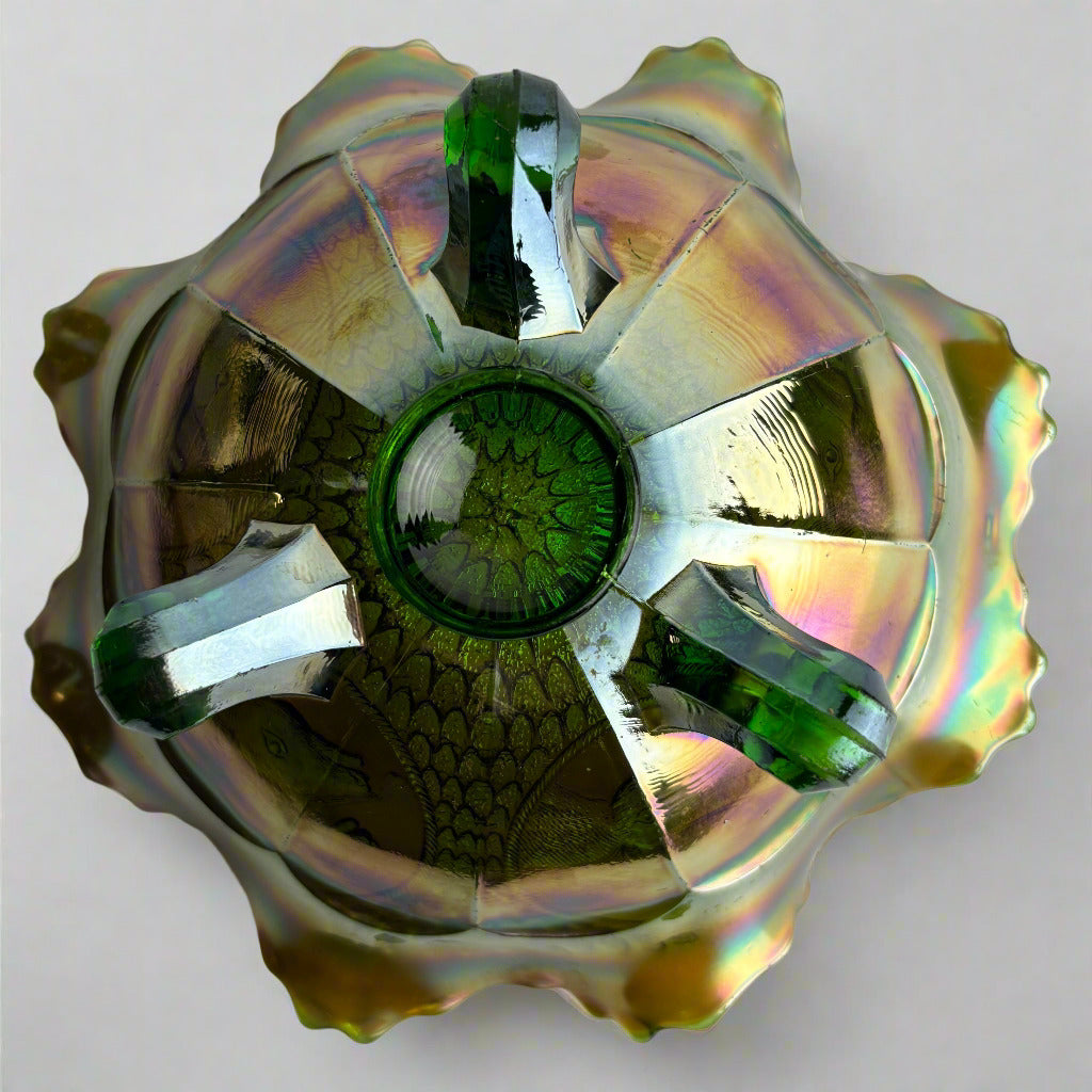 Decorative glass piece with iridescent colors on a white background