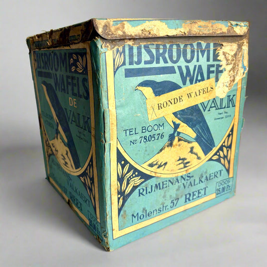 Vintage box with decorative design and text on a white background