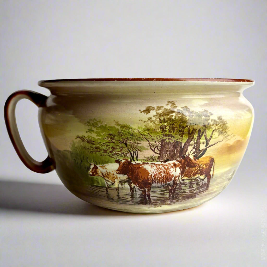 Ceramic bowl with cow illustration on a white background