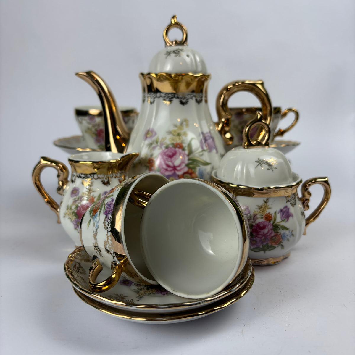 Floral gilt porcelain miniature tea and coffee service view 2