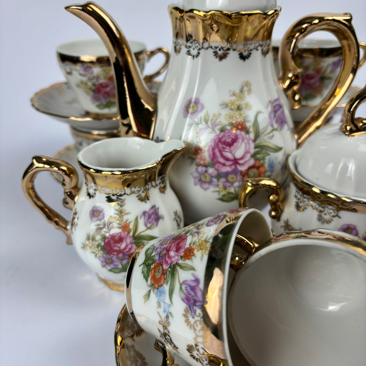 Floral gilt porcelain miniature tea and coffee service view 4