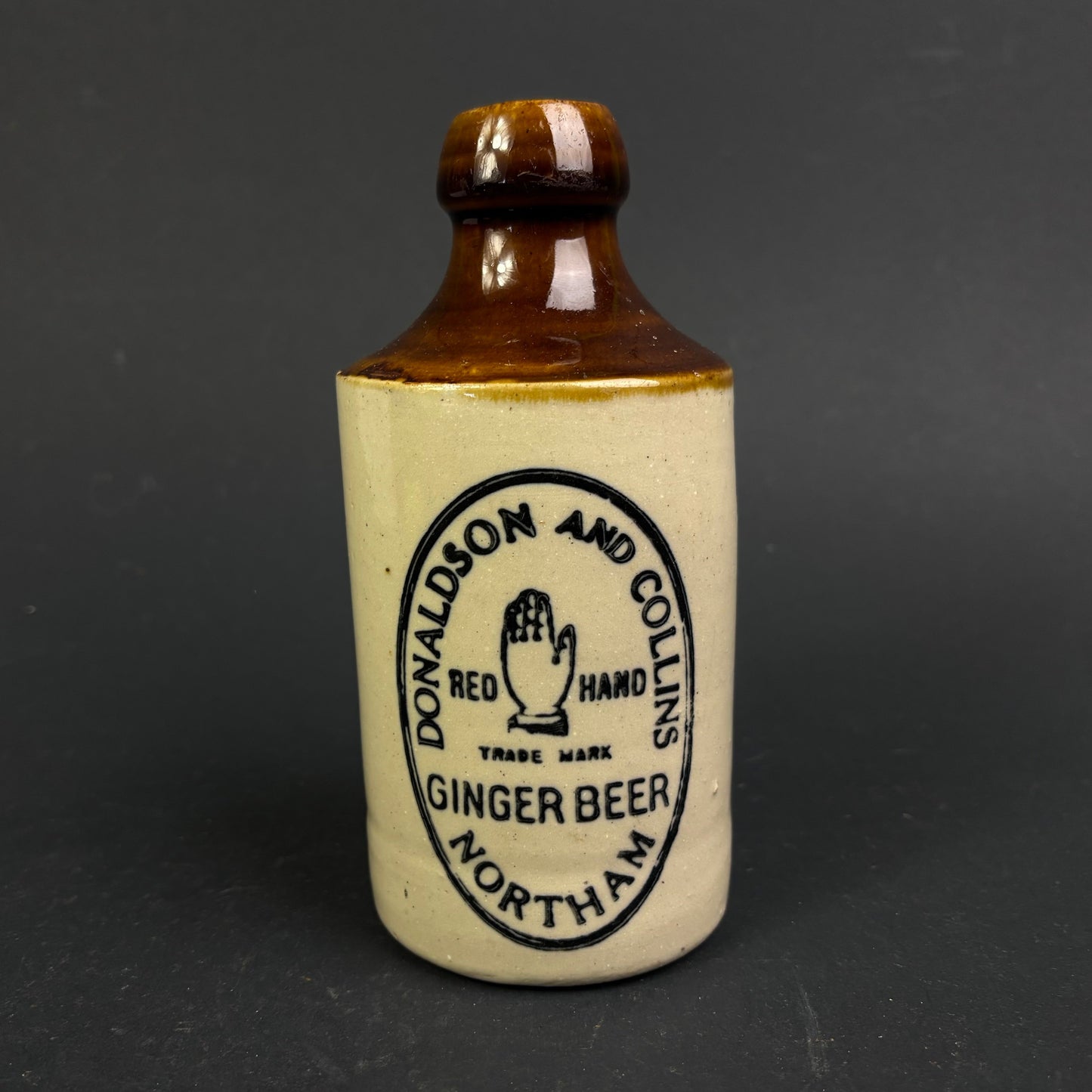 Donaldson & Collins "Red Hand" Ginger Beer Bottle – Northam WA Stoneware Advertising Bottle c.1900–1915