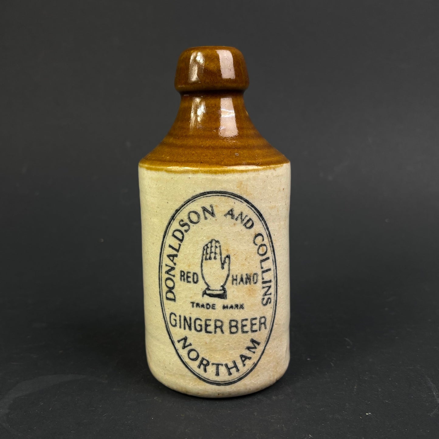 Donaldson & Collins "Red Hand" Ginger Beer Bottle – Northam WA Stoneware Advertising Bottle c.1900–1920