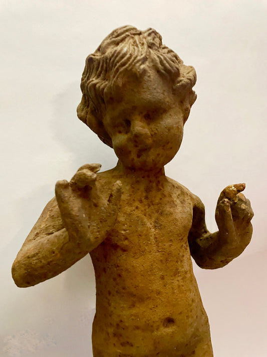 Cast iron boy statue