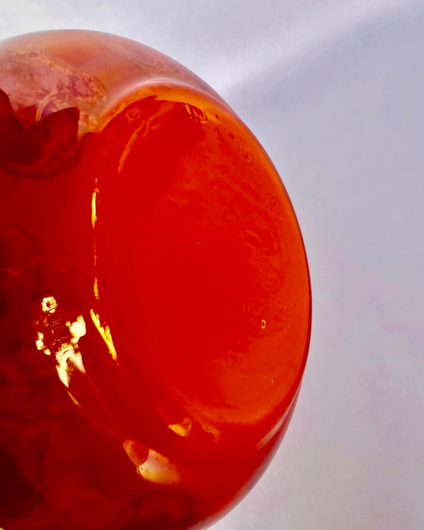 Encased orange art glass vase