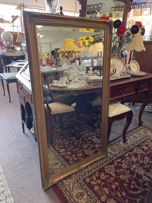 Large vintage ornate gilt framed mirror with beveled edge